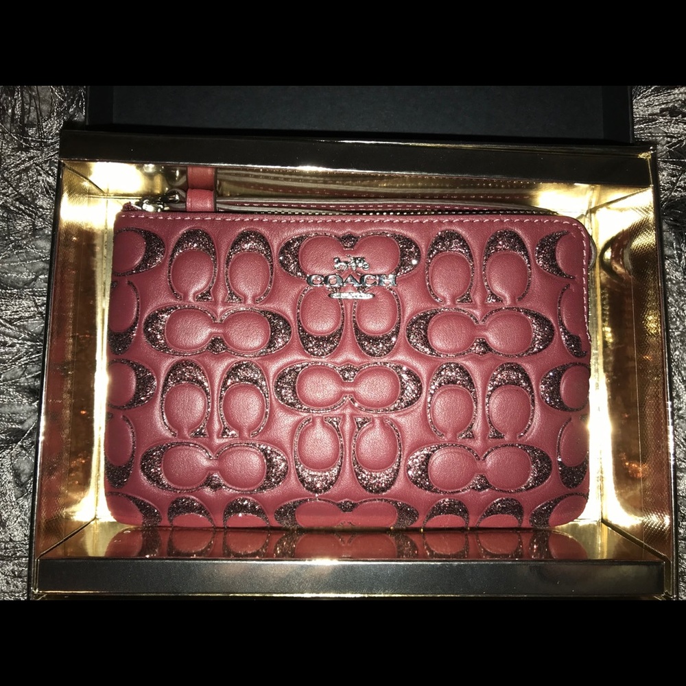 Burgundy Coach Wristlet. NEW WITH TAGS